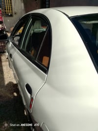 كيا ريو 2005 وارد امريكي كير ومحرك مكفول اوتماتيك حداديه جديده كهربائي...