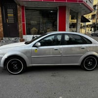 وبتره موديل 2004  مكينه وكير مال حويه شادهن جدد عرضه 53 (07734004025