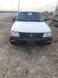 ميتسوبيشي • ٢٠٠٤ • مكينة وكير جديد