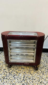 صوبه كهربائي ماركه نوال 5 شمعات شغاله وجديده ب25 بغداد 07875843828