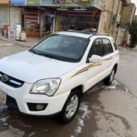 عندي كيا سبورتاج 2009 وارد خليجي فول مواصفات واحد على واحد  سياره جديد...