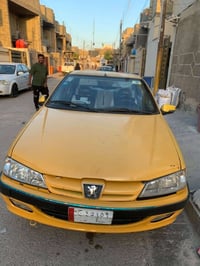سياره بيجو بارص 2015  السعر 40ورقه وبيها مجال مكاني بغداد العبيدي  077...