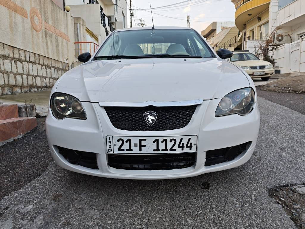 پڕۆتۆن ٢٠٠٩ 
سەیارەکە زۆر مەزبوتو بێ تەقەوڕەقەیە 
٤تایەی تازەی لەژێرایە گێڕو مەکینەو تەقەوڕەقە بەشەرت
سەنەوی و ڕەقەموهەموشتێکی تازەیە 
٣ پارچەی بۆیاخە 
سەیارەکە بەس ماشەڵای ئەوێ 
سعری ٥٧ گەڵا
*********** السليمانية, العراق
