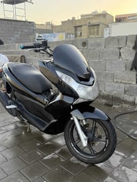Pcx جيل اول ياباني  دراجه نضيفه وشوفه عينك مكان حي اور جامع الفردوس  ا...