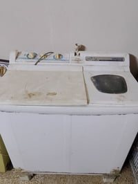 غساله هيتاشي للبيع شغاله 07708229315