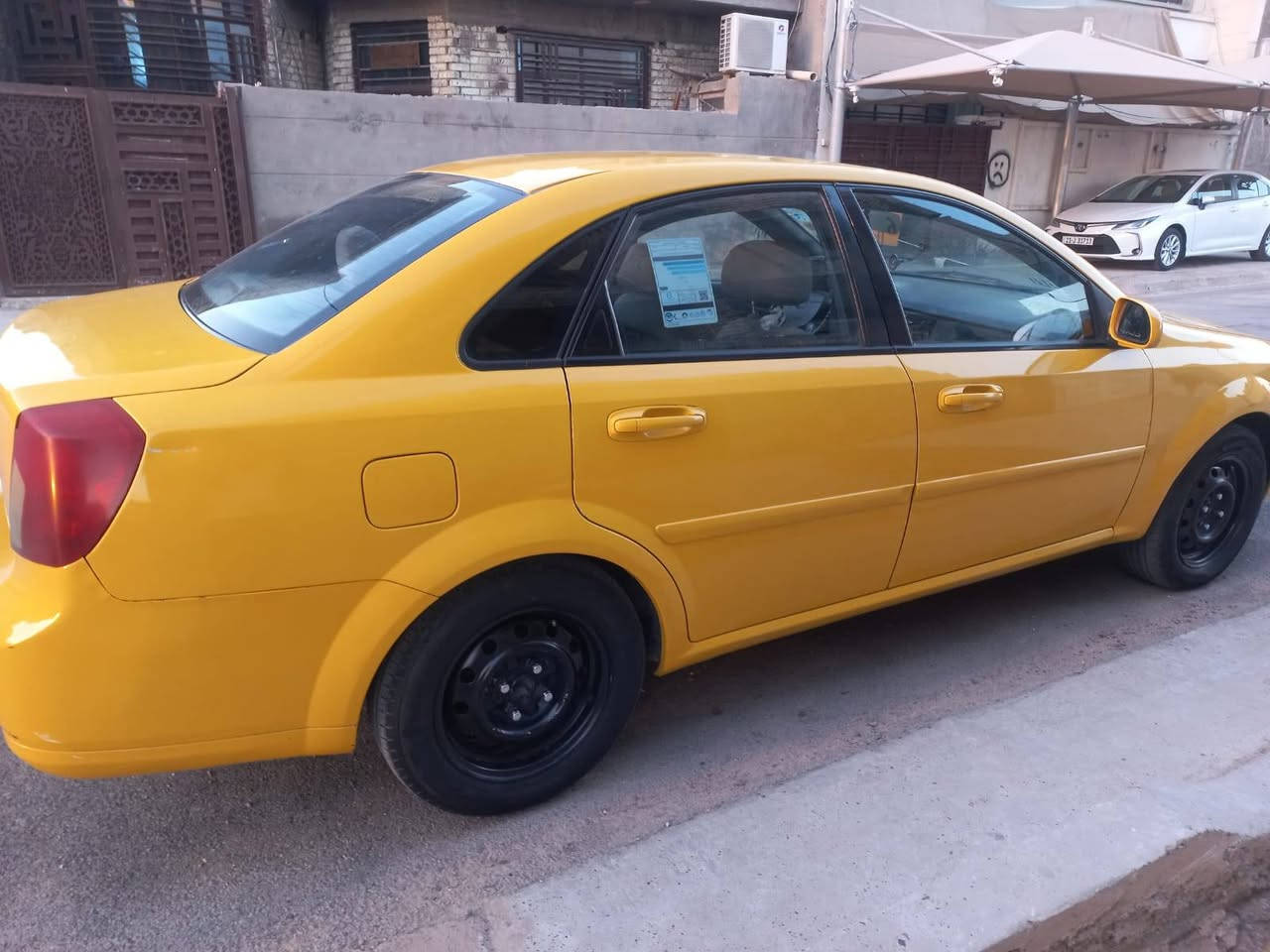 اوبترا موديل ٢٠١٠ ... رقم ديالى مشروع وطني بأسمي 
كير مكينة كهربائيات جيدة جدا 
تبريد شغال 
شاشة و كاميرة 
تخم تاير نظيف 
يحتاج الها درايم شفت بي صوت 
الجاملغ الأيمن مبدل ومصبوغة عام للجمالية 
السيارة قطرة اخياس ما بيها 
ترايك للموصل 
السعر ٦٥ وبي مجال 
مكاني بغداد الجديدة 
للاتصال ***********

