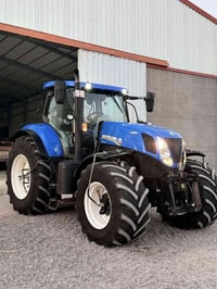 نیوهولند حجم 270 مودیل 2014  7000مشتغول  رقم ساحیب  07514042677 075078...