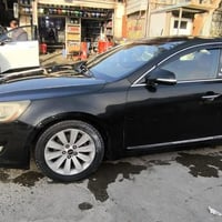 كيا كادينزا k7 للبيع موديل 2012 بيها صبغ ربع البنيد وشوية بالباب الخلف...