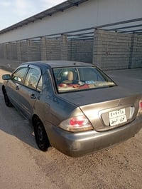 ميتسوبيشي لانسر • جير اوتوماتيك • ٢٠٠٩