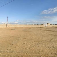 أرض ٢٠٠٠م • خلف مستشفى الحسين • مبادلة بسيارة