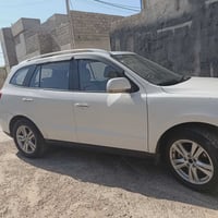 سنتافي موديل 2011 لبيع بيها نص باب صبغ واشويه تعديل بارد بجاملخ من جهة...