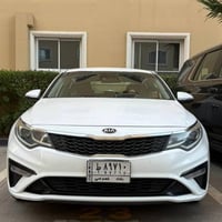 كيا أوبتيما 2019 وارد أمريكي لون أبيض رقم بغداد  السيارة نظيفة جداً بح...