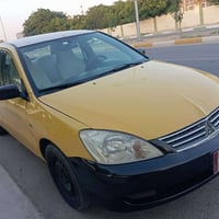 لانسر 2010 • رقم أصلي • ميكانيك تمام