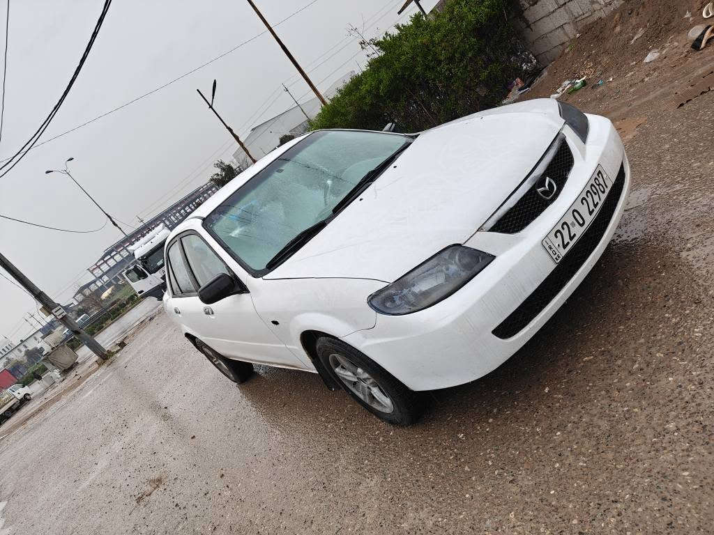 مازدا2003  سەنەوی هەزەوڕەقەمی نوێیە  بەشەرتی براوو وەرگەرانیە تحویل غرامە بەشەرت نڕخ 43/ *********** أربيل, العراق
