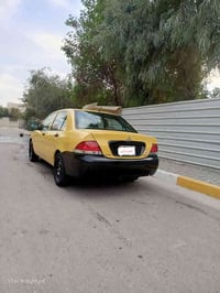 لانسر ٢٠١٠ مكفوله عده هلالات لخلفيه مكينه وكير كفاله مكينه الفين تبريد...