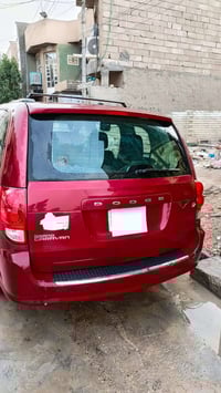 دوج كرفان ٢٠١١ رقم بغداد حمراء اللون بيبان وجنطه عادي تبريد ٣ قطع صبغ ...