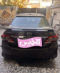 سيارة كورلا موديل ٢٠١٠ رقم بغداد السيارة بلادية وارد امريكي بدون لغد و...