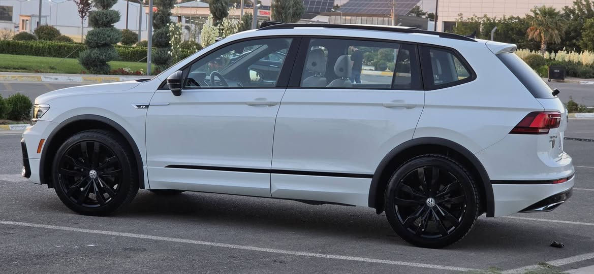 Volkswagen Tiguan SE R-Line 2021
***********
***********

se R-Line : مواصفات

حساس امام و خلفي و جانبي

بانوراما

مقاعد تدفية

المصابح الامامية ليد

ويل ۱۹ بلاك
٧راكب

رادار امامی

فووول فووول مواصفات

المحرك :

2.0 tsi turbo

184hp

4 cylinder

4 gear Mode

Eco

Custom

Normal

Sport

ماشية ٤٣الف مايل حقيقي

بدون صبغ تبديل بدون الايرباك كلها سليمة
العنوان السليمانية معرض باران السليمانية, العراق
