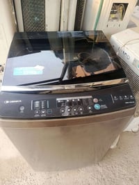 غسالة أوتوماتيك • نظيفة • بعقوبة العزات