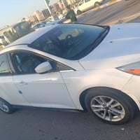 فورد فوكس 2018 SEL  رقم ذي قار ماشية  130 الف كيلومتر سلايت كشن و ستير...