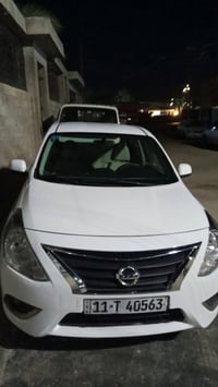 نيسان سني 19 لون ابيض   رقم بغداد انكليزي جديد  هزه جديده شاشه + كامير...