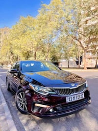 اوبتيما 2019 امريكي  رقم بغداد انكليزي باسمي  مكينه 2400 مكفوله  ماشيه...