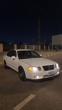 كيا اوبتما • ٢٠٠٥ • رقم نجف انكليزي