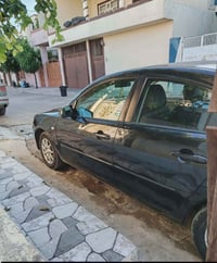 مازدا ٣ • ٢٠٠٩ • بويا جزئين