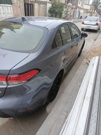 كورلا هايبرد موديل ٢٤ماشية ١٥الف السعر١٦٠وبيها مجال صورة الحادث مع الص...