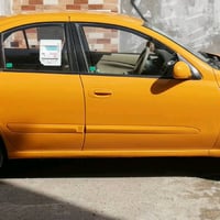 نيسان سني سامسونج موديلها 2009 رقم بغداد سيارة بسمي هيئة وغرامات مصفرة...