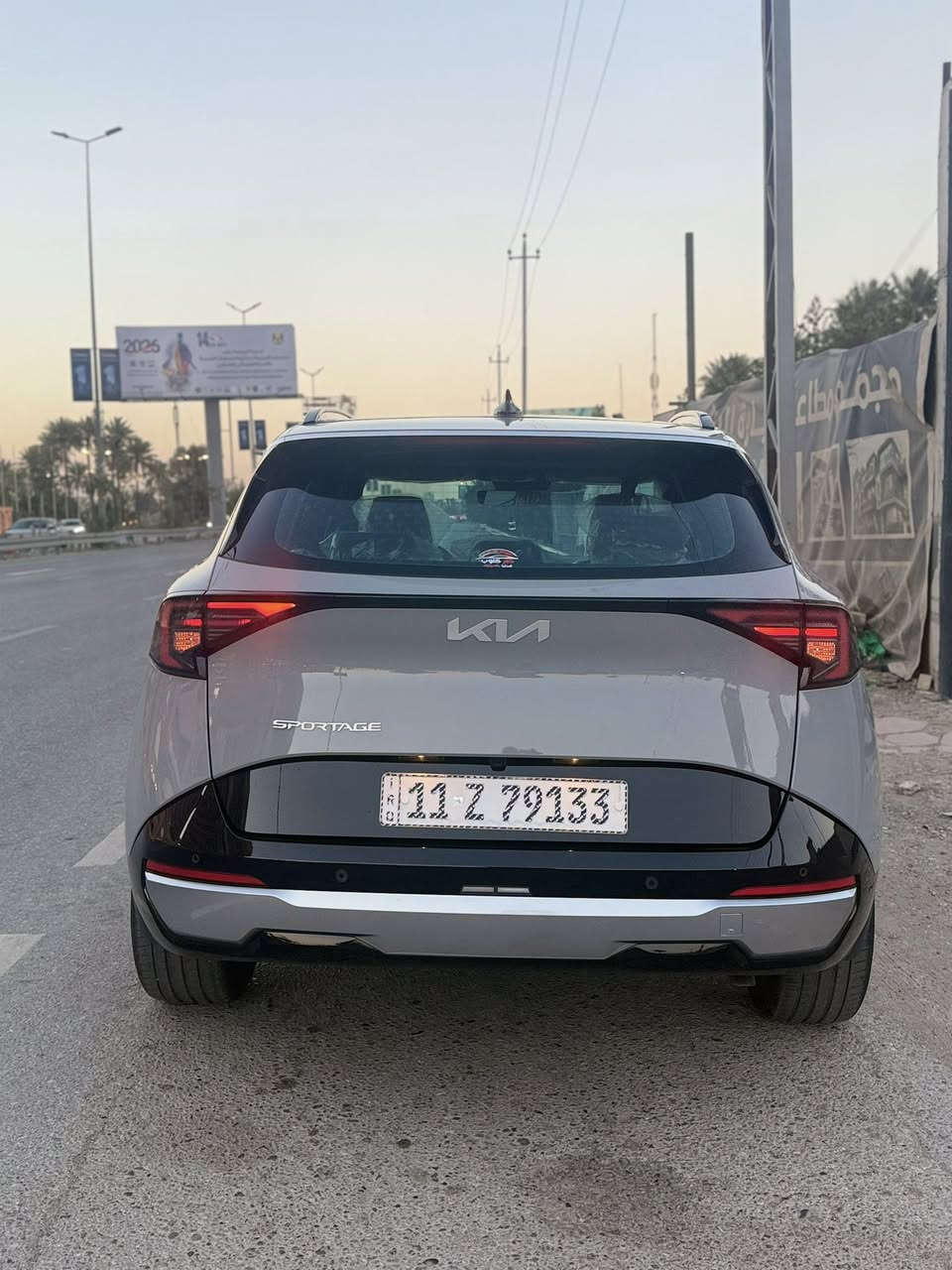 � كيا سبورتج 2026 VIP – الفئة الجديدة 🔥 السيارة مغلفة PDF بكمل
وبيه بارد عل كد اصبع فقط 
ماشية 2600km يعني زيرو
‏ جام  الأمامية ضد الكسر 
وباقي ضد الشمس بس هاي كلفتني 2000$
بانوراما | 4 كامرات | 12 حساس | مقاعد تدفئة وتبريد | أوتو بريك

💰 السعر: 43مليون وبيه مجال قليل 

المحرك: 4 سلندر DOHC سعة 2.0 لتر – بنزين
ناقل الحركة: أوتوماتيك 6 سرعات
الضمان: 5 سنوات أو 100,000 كم
اللوحات: بغداد

⚙️ 
أنظمة الأداء والأمان

• أوضاع قيادة متعددة (Drive Modes)
• نظام مانع الانزلاق ESP
• نظام نزول المنحدرات
• Auto Hold
• نظام الفرملة التلقائية (Auto Brake / AEB)
• نظام النقاط العمياء
• شاشة عدادات مزوّدة بكاميرات يمين ويسار
• 6 وسائد هوائية
• 12 حساس أمامي وخلفي
• ISOFIX لتثبيت مقاعد الأطفال

🛋️ 
الداخلية والراحة

• مقاعد جلد قرميدي مع بطانة الأبواب
• تحكم كهربائي بالمقاعد الأمامية
• تدفئة وتبريد للمقاعد الأمامية
• ستيرنك رياضي D مطرّز جلد بلونين
• دخول ذكي
• تشغيل المحرك عن بُعد
• صندوق خلفي كهربائي
• شاحن لاسلكي

📱 
التقنيات

• شاشة عدادات رقمية متصلة
• شاشة وسطية تعمل باللمس
• Apple CarPlay
• نظام صوتي مع أوامر صوتية
• تحكم من المقود
• تكييف بشاشة متغير مناخين (Dual Zone Climate Control)

💡 
الخارجية

• سقف بانوراما
• الترايش / الإطار الأمامي Piano Black
• إضاءة خلفية LED
• مصابيح أمامية زينون
• إضاءة LED نهارية
• مرايا جانبية كهربائية الطي مع إشارات
• إطارات قياس 235/50R19

📞 للتواصل والاستفسار:
***********
