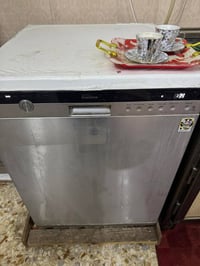 ورشة الملتقى • صيانة غسالات أوتوماتيك • القرنة