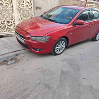 لانسر قرش16 خليجي محرك 1600بيه تبخير السعر 68 مكان بغداد حي الجهاد 077...