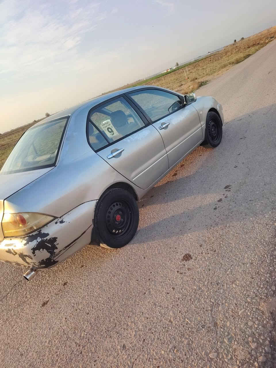 سلام عليكم سياره لنسر 2006 سياره رقم صلاح الدين دولي سنويه لل 29 سياره خير من الله كلها شغاله محرك مكينه مكفوله مابيها اي ضرر تدفئه تبريد شغالات قطعه صبغ خفيفه بيها فقط بالجاملغ الوراه بدون دواخل السعر 70وبيها مجال مامتواجد عالخاص فقط عالرقم مكاني صلاح الدين الطريشه ***********
