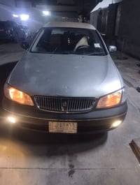 نيسان صنى موديل 2000ره قه م بغدا مشروع وطنيه  65$ 07508258966