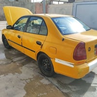 اكسنت فيرنا • ٢٠٠٠ • رقم بغداد