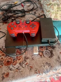 بلايستيشن 2 • شغال • يد واحد