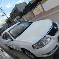 نيسان صني موديل 2010 ابيض صدفي،، السعر 108$ 4جامات كهربائي ، تايرات جد...