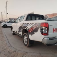 ميتسوبيشي L200 موديل ٢٠٢٣ فور ويل مكفولة عداد حقيقي ٦٩ السعر ٢١٠ 07812...