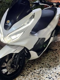 دراجة pcx الجيل الثالث _ياباني_ ياباني _ مكينه 150 cc كفالة  كفرات اصل...