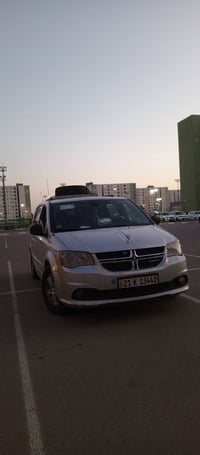 دوج كراند كرفان للبيع 2012 رصاصي  داخله كلين بلعراق ربع چاملغ ايمن ورب...
