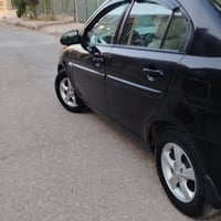 اكسنت 2009 كوري كير مكينة مال كصة 16شرط جامات كهرب قفل مركزي صبغ 4 قطع...