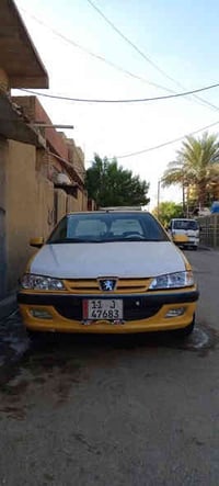 بيجو بأرص ٢٠١٥ بيه طختين بل جاملغات الخلفيه بس سياره خير من الله مكينه...