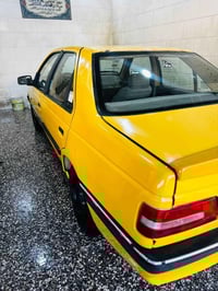 بيجو 405  موديل2016 رقم ميسان تخم تاير وحداديه ومشط ستيرن ومازدات وكهر...