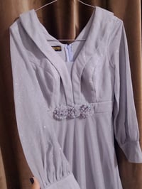 فستان مناسبات قياسه XL لونه سمائي سعره 20 رقم الموبايل 07872061437