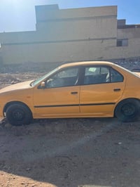 بيجو سمند • ٢٠١٠ • هيئة وغرامات مصفرة