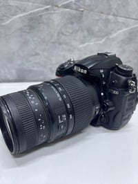 كامرتين نيكون • زوم رياضي • بطاريه وشاحنه ورام