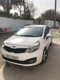 كيا ريو خليجي  2013 دوش لون 1600 ابيض  نظيفة فقط حزام صبغ جمالية   تبر...