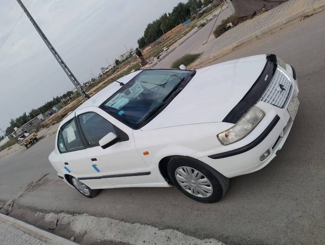 سمند ناطقه موديل 12 كرستال اصل رقم واسط مشروع وطني سنويه لل 28 مكفوله كفاله من الظربه  والتبديل معمر هلالات ودوس وبيه رشات صبغ مكينه كير مكفولات تبربد كمبريسر وكفت كهربائيات كله شغاله السعر 33 بيه حك الجيه مكاني الكوت ***********
