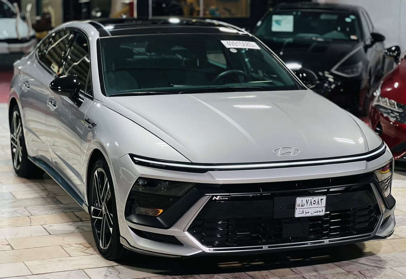 ‎سوناتا N line 2024 
‎السيارة كلين ..فقط بارد بسيط 
‎موصفات فول 1/1
‎حجم المحرك 2.5 تيربو 
‎ماشية السيارة 5 مايل
‎مفتاح التشغيل بصمة 
‎حساسات أمامية و خلفية 
‎رادار خلفية توقف ذاتي 
‎لايت زينون + LED متصل 
‎بك لايت LED متصل 
‎دخول بصمة ذكي 
‎هاند بريك كهرباء  
‎دشبول شاشة ديجيتال متصل 
‎شاشة Apple Car play and Android Auto 
‎كاميرا دوارة تصوير 3 وضعيات
‎الانارة الداخلية LED ٦٤ لون متغير 
‎مقود جلد 
‎ارضيات كاعيات وصندوق اصليات
‎شفتات مقود مثبت السرعة Cruise 
‎المودات والاوامر الصوتية 
‎شاحن هاتف Wireless 
‎مخرج منفذ الطاقة type C
‎المقاعد حضن سبورت جلد + شامو وحرفN
‎حركة المقاعد الأمامية كهرباء 
‎تبريد شاشة مناخين منفصلين 
‎تطعيم الدواخل كاربون فايبر سلفر
‎مكان السيارة نجف 
‎السعر 240 وبيها مجال
‎رقم موبايل / ***********
